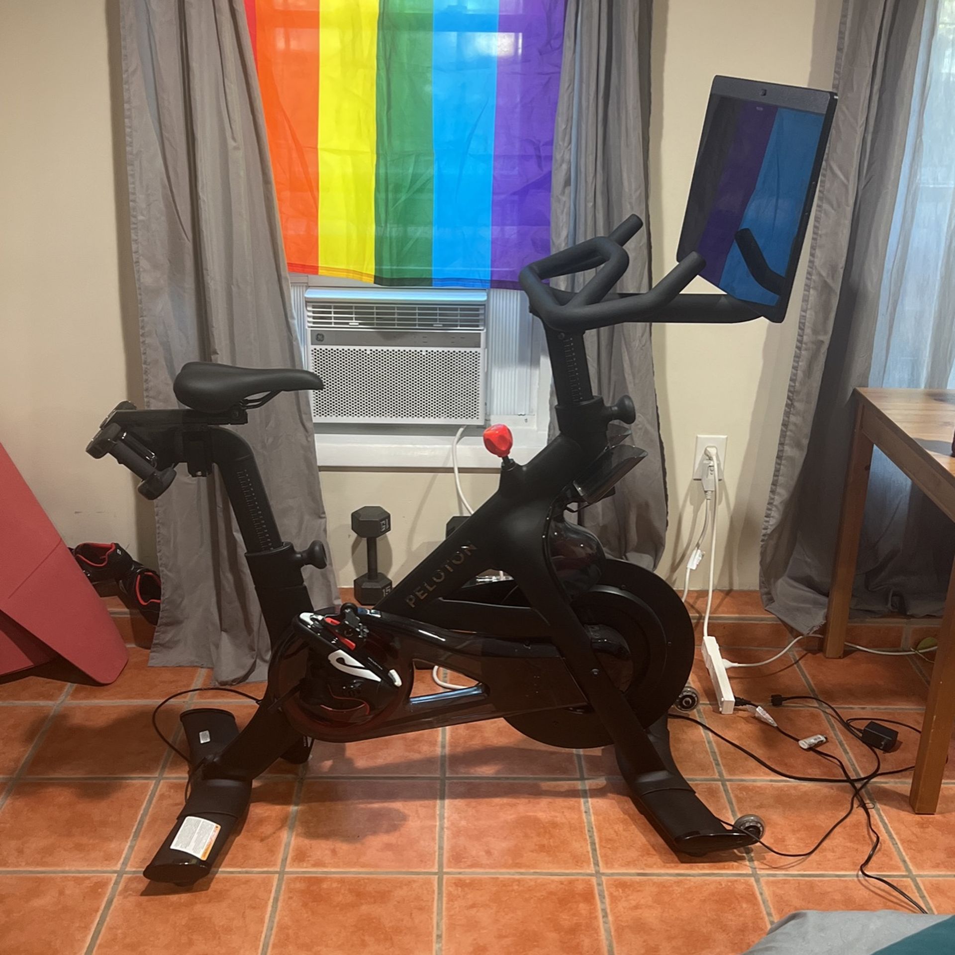 Peloton Bike + W/ Two pairs of shoes And Yoga Mat/3lb Weights 