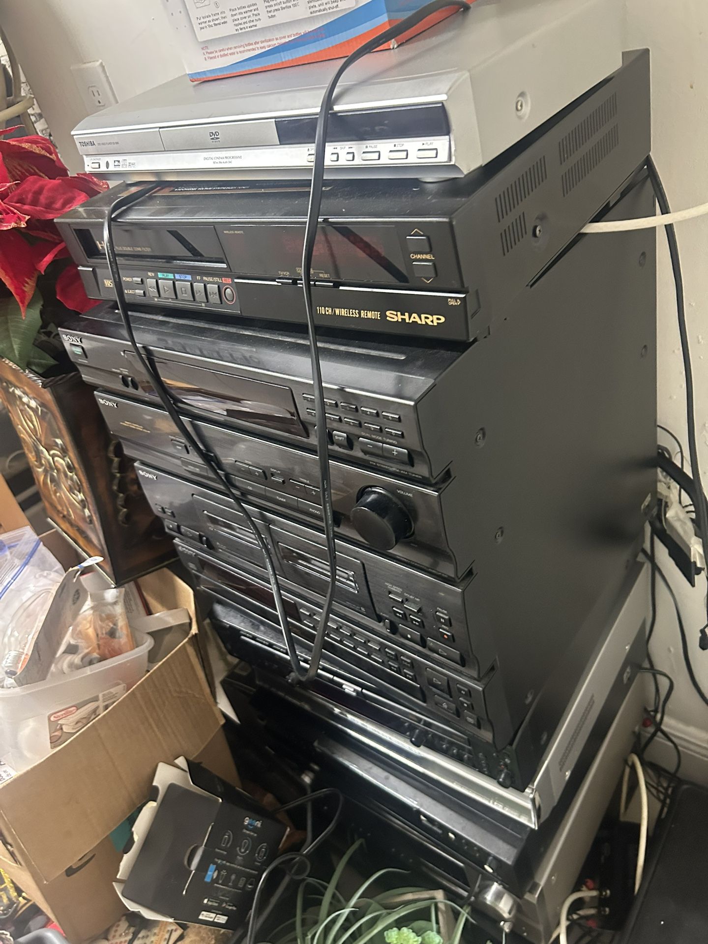 Pile Of Subwoofers Receivers Speakers 