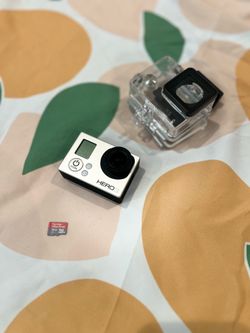 GoPro Hero3 camera w/ waterproof case and 16GB micro SD card