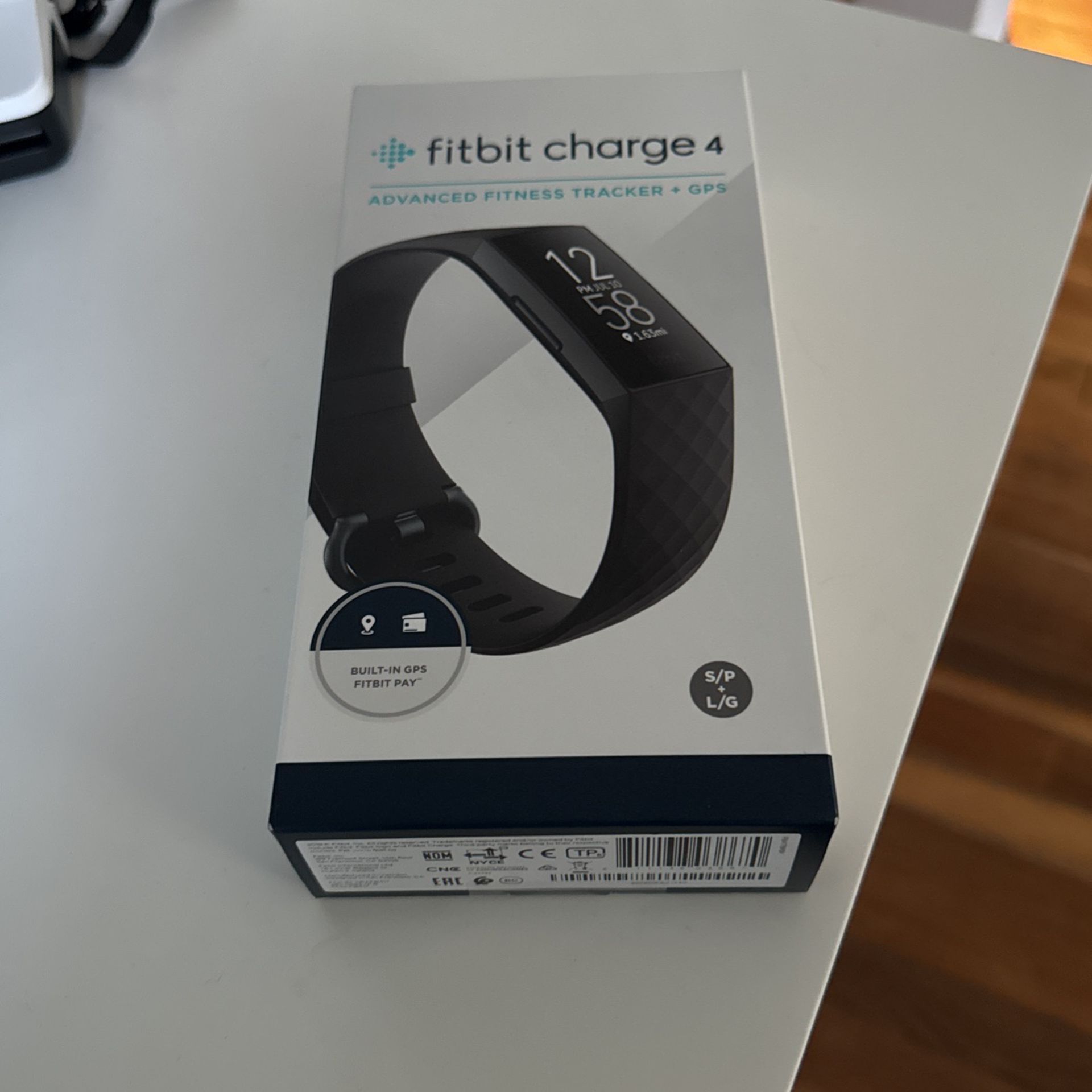 Fitbit charge 4 (Brand new) Unopened 