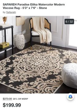 Cream and black area rug 5x7
