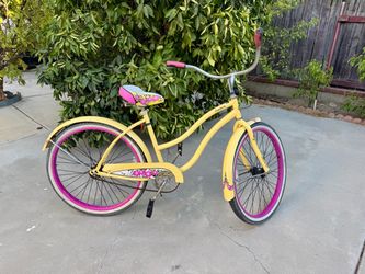 HUFFY 26” CRANBROOK YELLOW AND PINK WOMAN’S CRUISER BIKE