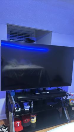 75 inch Samsung tv with sound bar and stand holder as you can see on the pictures
