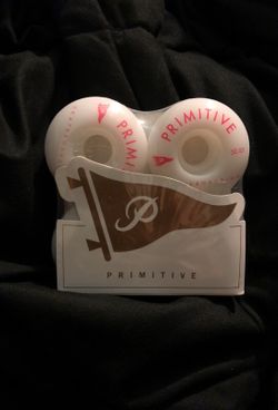 Primitive skateboarding wheels