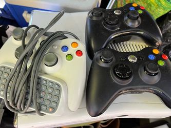 Xbox 360, three remotes and 20 disks