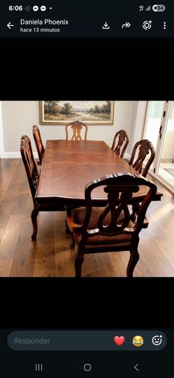 Dining table and 6 chairs. Like New. Ashley Furniture