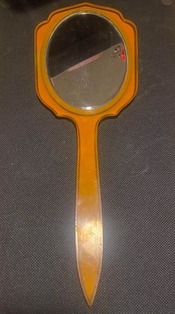Vintage bakelite hand mirror from the 1930s