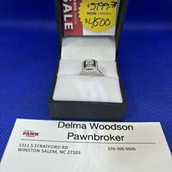 Platinum Emerald Cut Diamond Ring