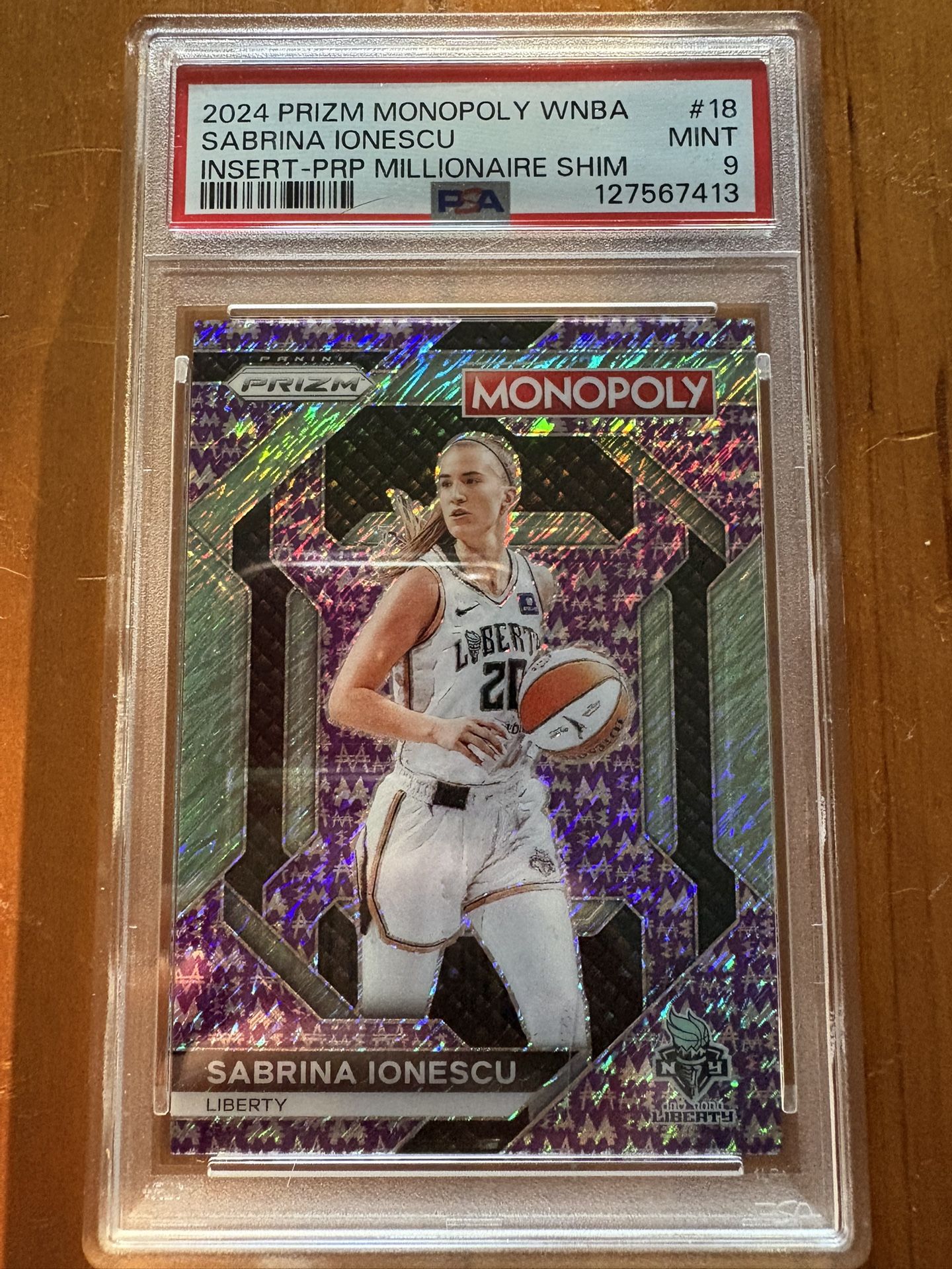 Sabrina Ionescu Purple Shimmer Monopoly Prizm PSA 9