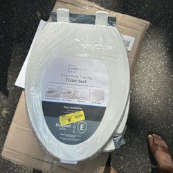 Mainstays Plastic Elongated Unisex 2-in-1 Potty Training Toilet Seat in Daisy White Toilet Seat