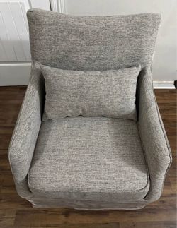 Martha Stewart London Upholstered Swivel Armchair with Skirt and Lumbar Cushion. Spins 360.