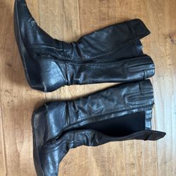 Worn black boots 