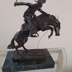 Remington Bronco Buster Statue