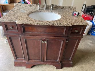 Bathroom vanity with granite countertop  dimensions are in pictures