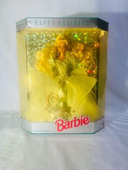 This is a Mattel 1992 Special Edition Happy Holidays Barbie doll