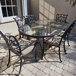 75" X 43" Oval Outdoor Aluminum Glass Table With 7 Chairs