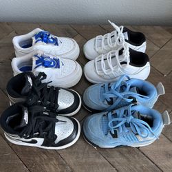 4 Pairs Of Toddler Nike Shoes ( Jordans And Air Force )