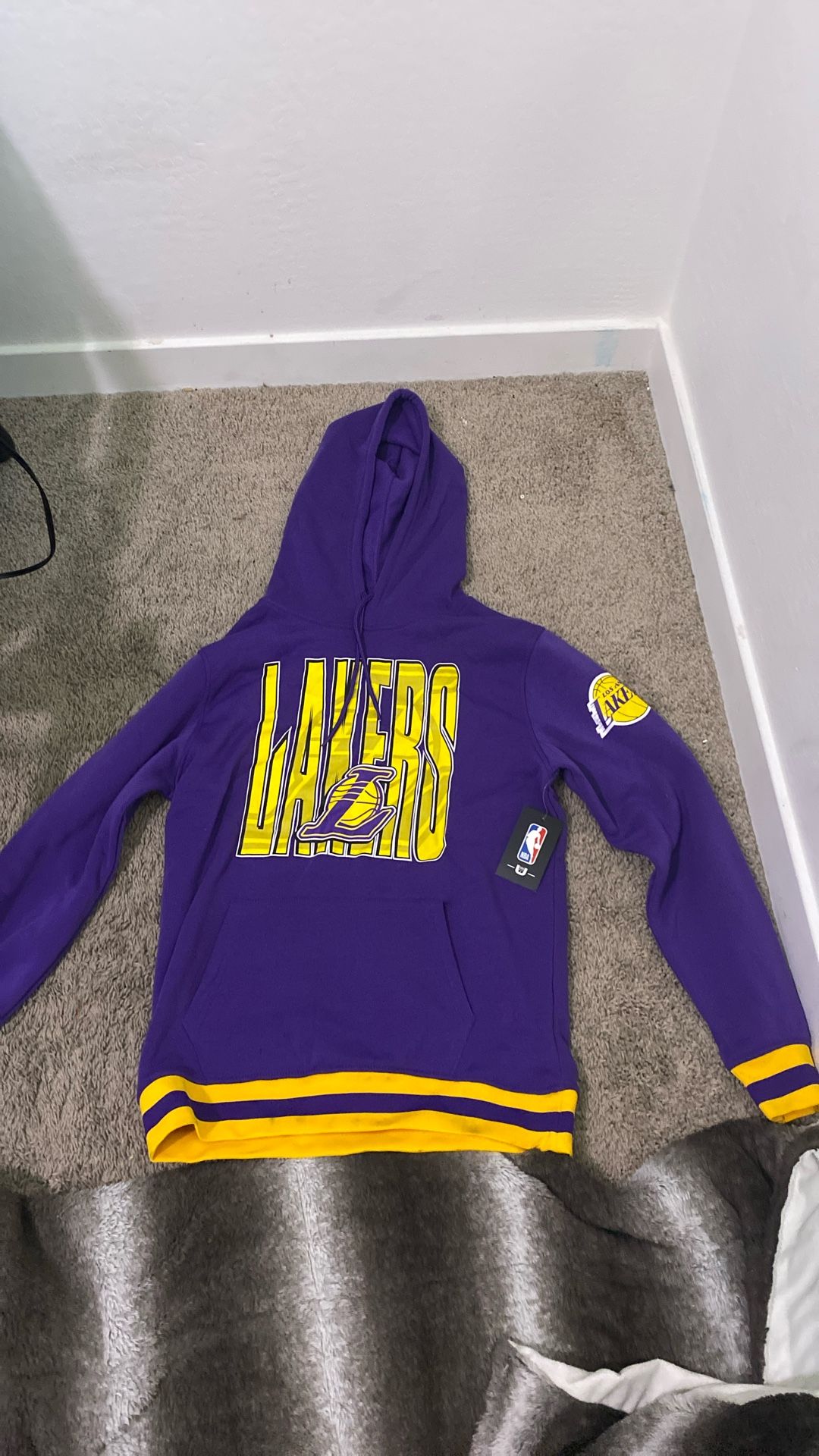 The Color Is Purple And Yellow Size. Small Never Worn. Brand New Still Has The Tags On It .