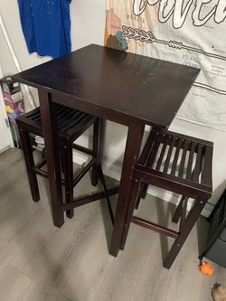 Bar top table and chairs