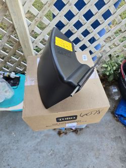 Toro self propelled mower rear discharge chute