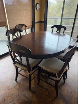 Pedestal Dining Table with a Leaf Extension and matching Rush-Seat Side Chairs