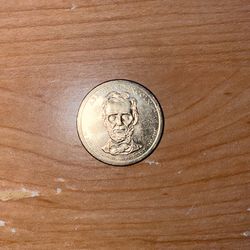 Abraham Lincoln Gold Dollar Coin.