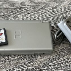 Silver Nintendo DS with a game, complete with stylus & charger.  $60