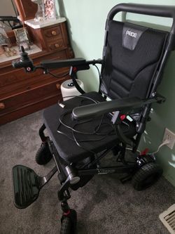 Power chair with joystick and charger
