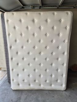 Queen sized mattress with Cast iron frame.