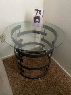 Round glass side tables