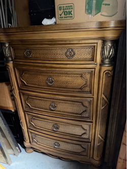 Upright dressers with matching wood bed frame, headboard and foot board.