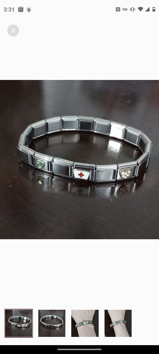 3 Charms Women's Italian Stainless Steel Nomination Style Stretch Bracelet
EUC
Silver with Green Birthstone
Gold White Red Nurse Charm
Gold Rhineston