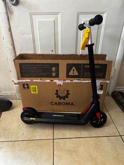 Kids caroma electric scooter