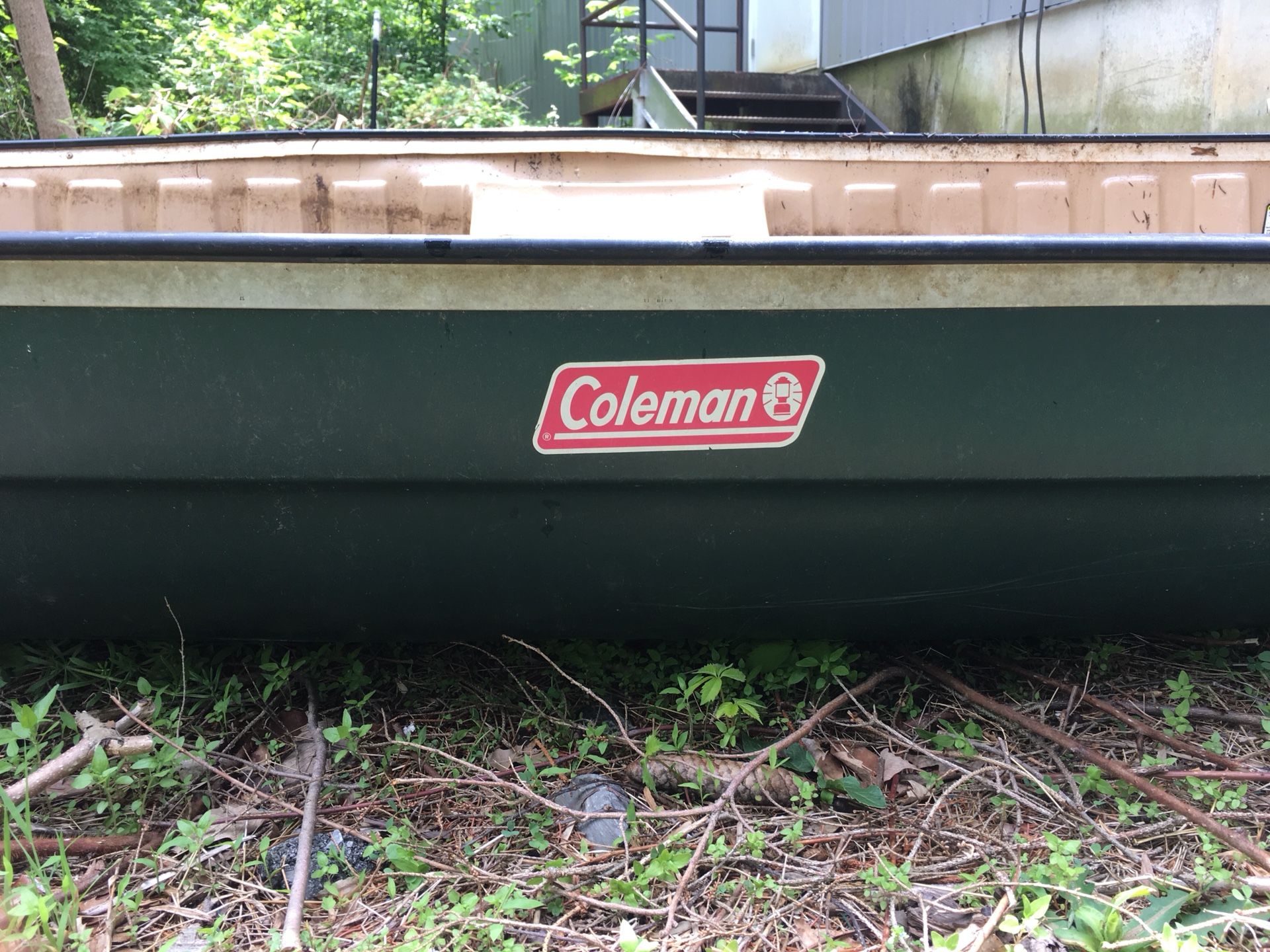 Coleman 16 ‘ canoe with built in cooler and seats. Cooler is removable with bungy cords to hold it