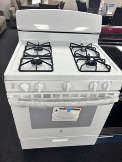 New GE 4 burner gas stove