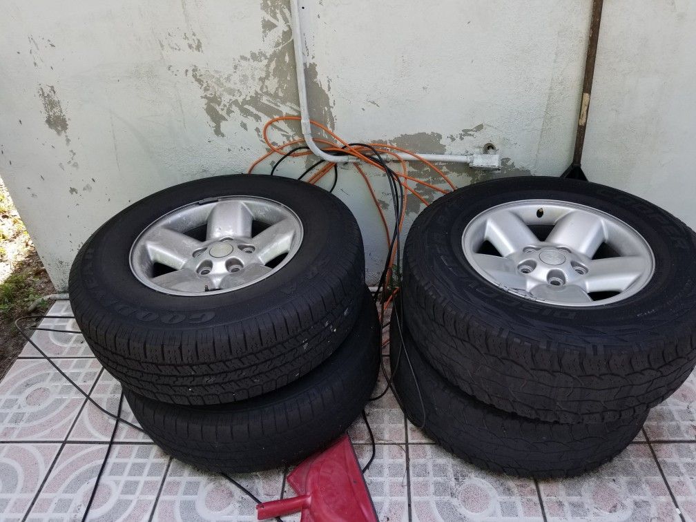 Dodge ram 1500 stock rims 5 lug