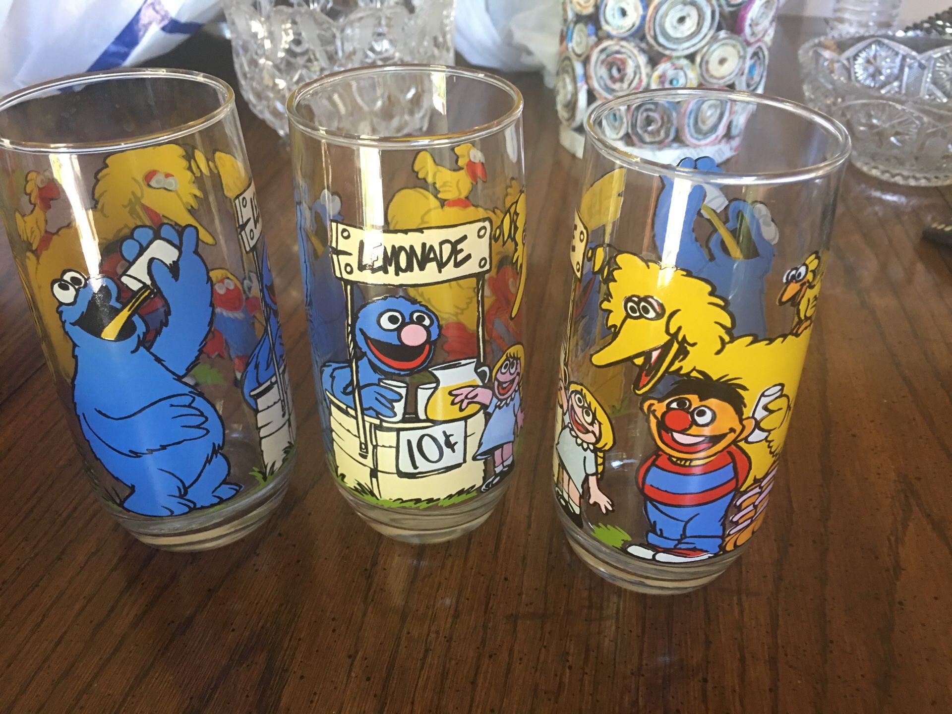 Three Sesame Street collectible drinking glasses
