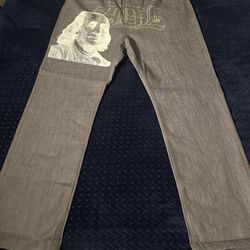Sky'sDaLimit (SDL) gray jeans Benjamin Franklin graphic print Size 42x32 Or Size 44 In SDL