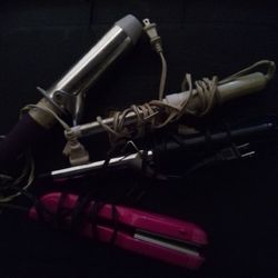 A Large Curling iron, A Small Curling iron And Hair Straightener 