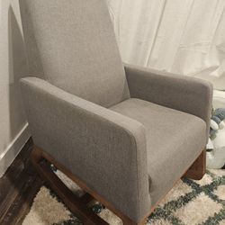 Gray Fabric And Wood Rocking Chair