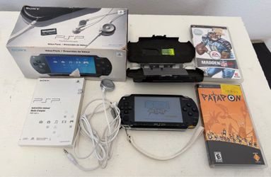 Sony PSP 1001 with box three games