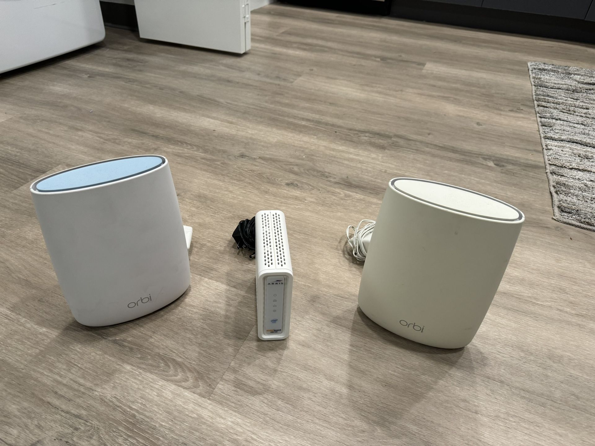 House Orbi Wi-Fi System with Arris modem