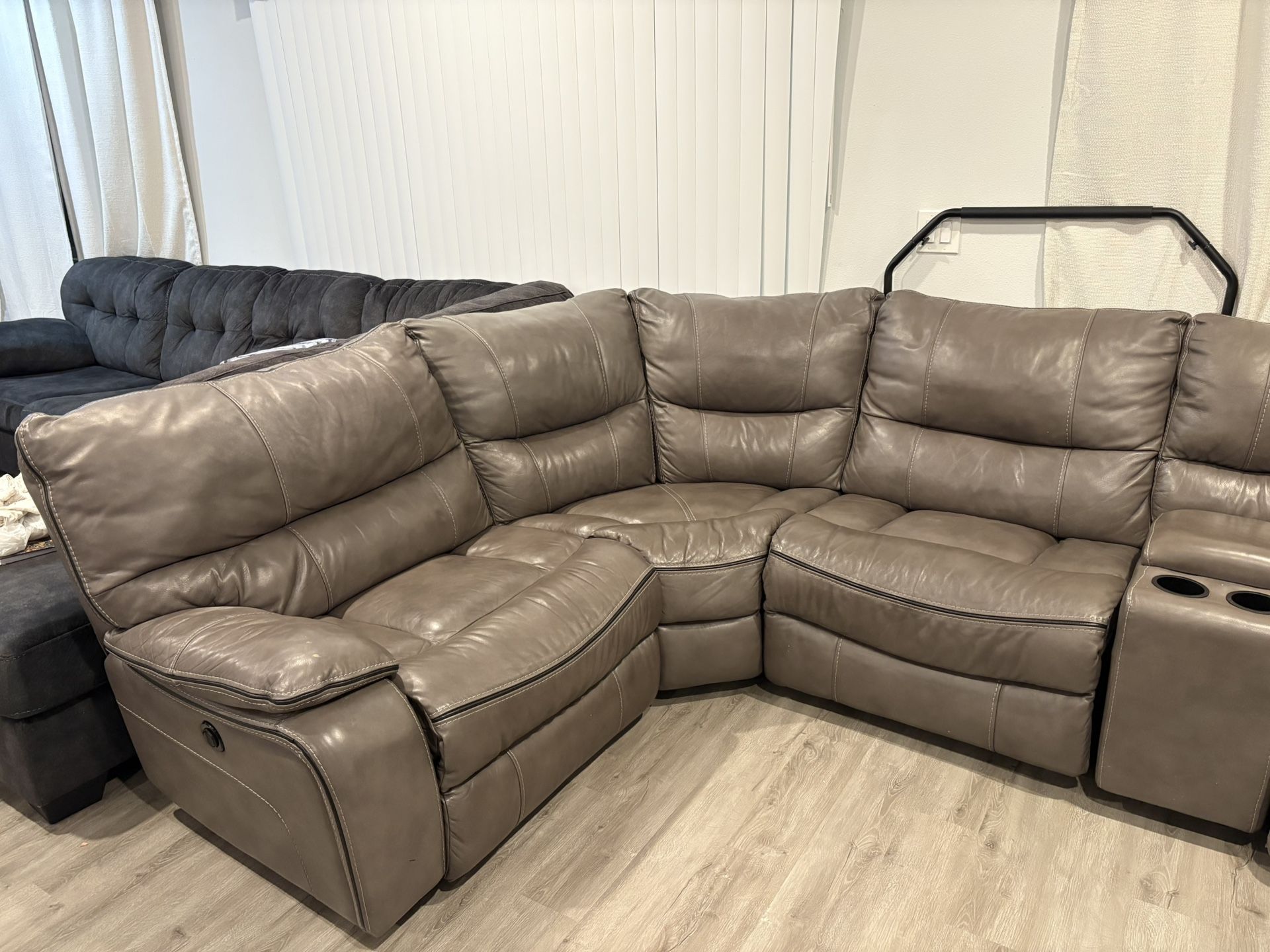REAL LEATHER COUCH WITH ELECTRIC LEG REST!! WORKS AND IS FLUFFY NO SINKING PARTS!