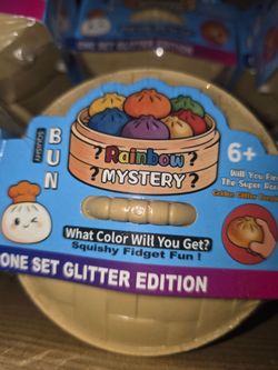 Rainbow mystery glitter squishy dumplings.