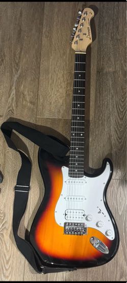 Fully electric guitar with amp