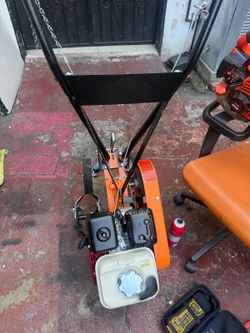 Tiller merry tine w Honda engine comercial grade like new as is