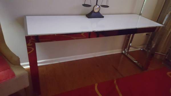 REDUCED.....SLEEK LONG 24D X 32H X 72W CHROME AND LAMINATED WHITE TOP....CAN BE USED FOR TABLE, DESK, TV STAND OR BUFFET TABLE