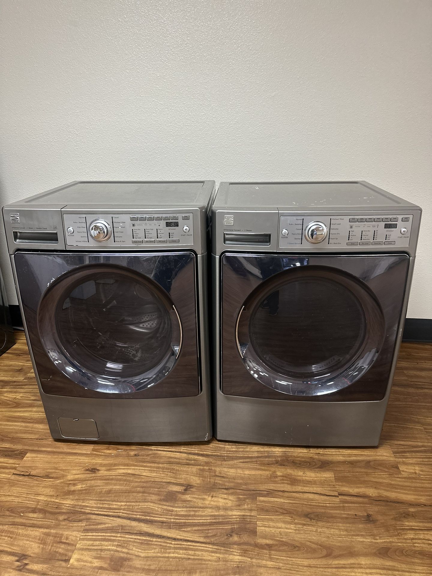 Kenmore  XL Capacity  Electric washer and dryer , comes with a 30-day warranty.