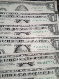 Star notes 1 and $2 bills