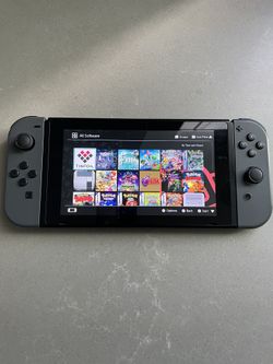 Nintendo Switch With Games & Gray Joy-Cons